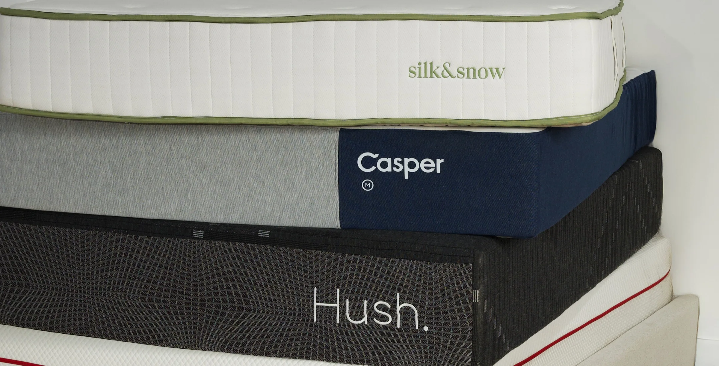 Stack of mattresses reviewed by Best Sleep Society